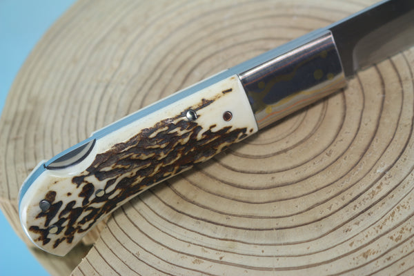 Fumio Inagaki FI-125 Jess Horn Folding Lock knife Replica, Premium Hitachi ATS-34 blade, Genuine Sambar Stag Handle with Rainbow Damascus Bolster