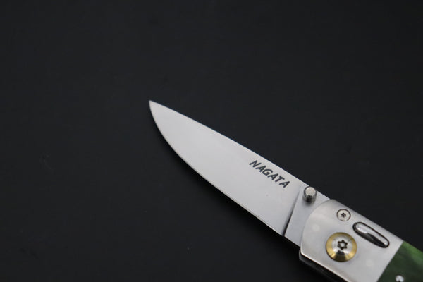 Ikuo Nagata Custom Folding Knife - IN-150 Bullet inlaid Jigg Bone Handle with Multi-Function Button
