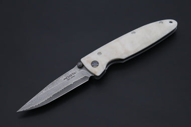 Mcusta Classic Wave Series MC-19D VG-10 Damascus blade with Dupont Corian handle