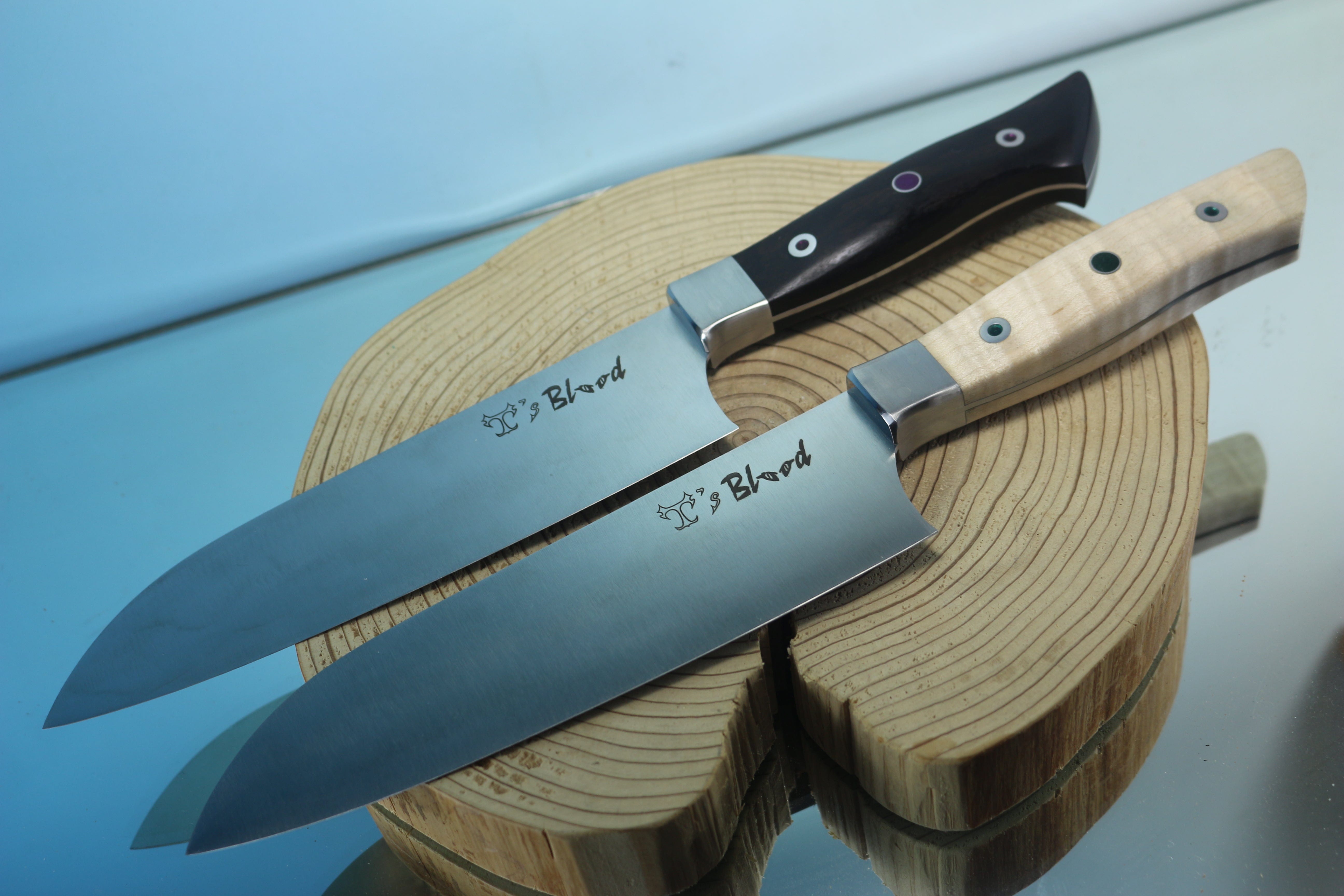 https://japaneseknifedirect.com/cdn/shop/files/takumi-ichikawa-custom-kitchen-knife-ti-20-santoku-180mm-7-inch-41653016658198.jpg?v=1688516723