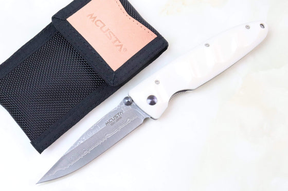 Mcusta Classic Wave Series MC-25D VG-10 Damascus blade with Dupont White Cream Corian Handle - JapaneseKnifeDirect.Com