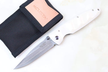 Mcusta Classic Wave Series MC-25D VG-10 Damascus blade with Dupont White Cream Corian Handle - JapaneseKnifeDirect.Com