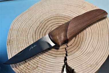https://japaneseknifedirect.com/cdn/shop/products/seizo-imai-si-16-gerber-folding-hunter-lockback-folder-hs-blade-walnut-wood-handle-17794480275501_380x.jpg?v=1607272539